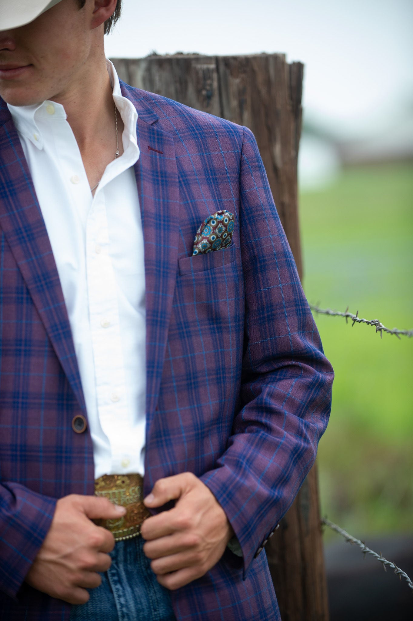 Men’s Western jacket in dark purple plaid paired with denim and boots
