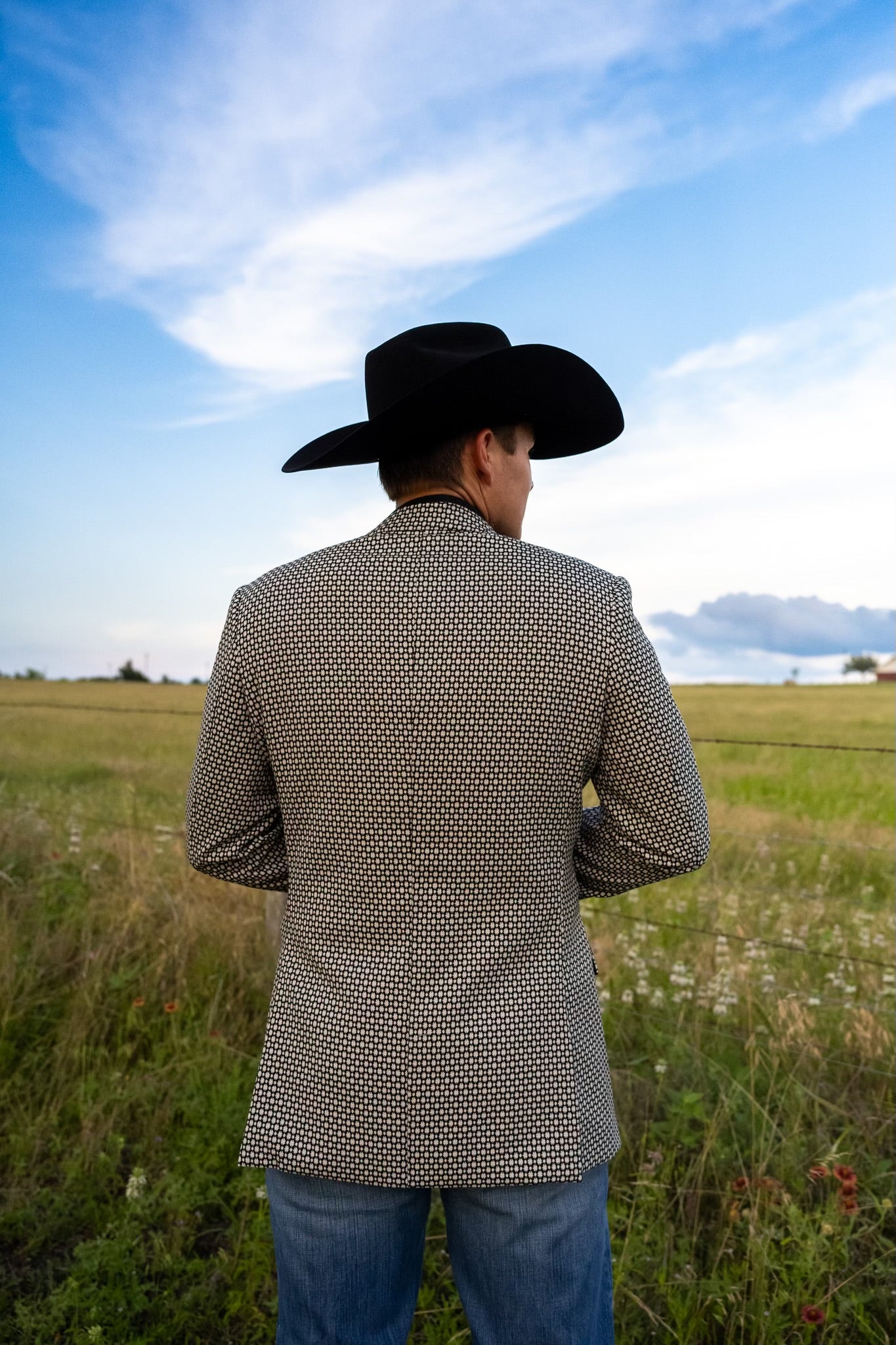 Black and White Cowboy Sport Coat styled with denim jeans and boots for Western formal look