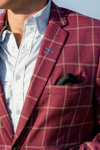 Red checkered blazer with a white shirt and black pocket square.