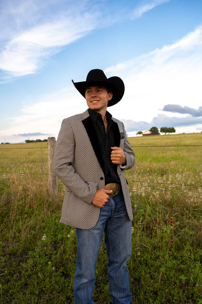 Side view of Black and White Cowboy Sport Coat with velvet lapel and geometric pattern
