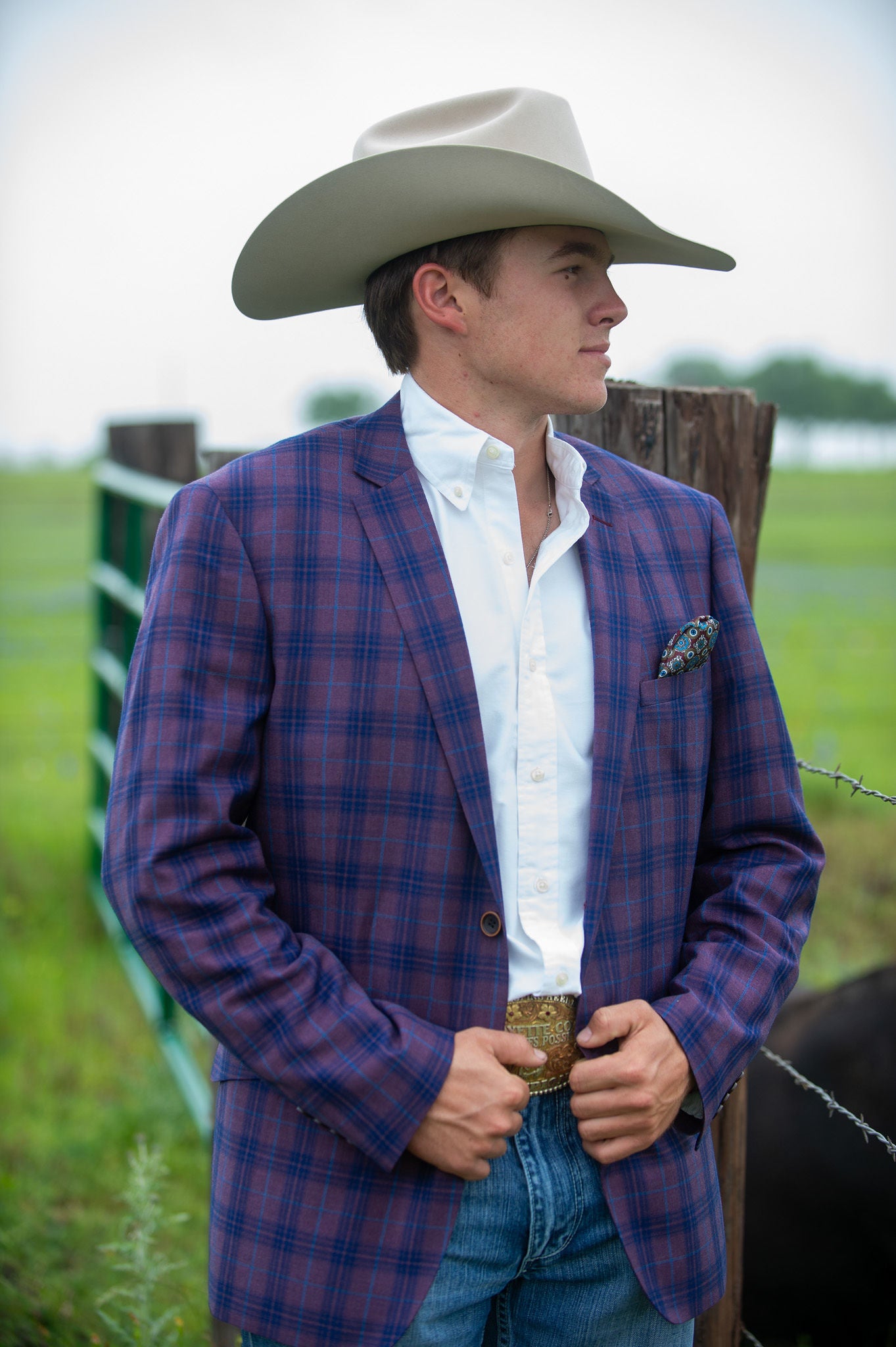 Close-up of dark purple and navy plaid texture on Western suit jacket