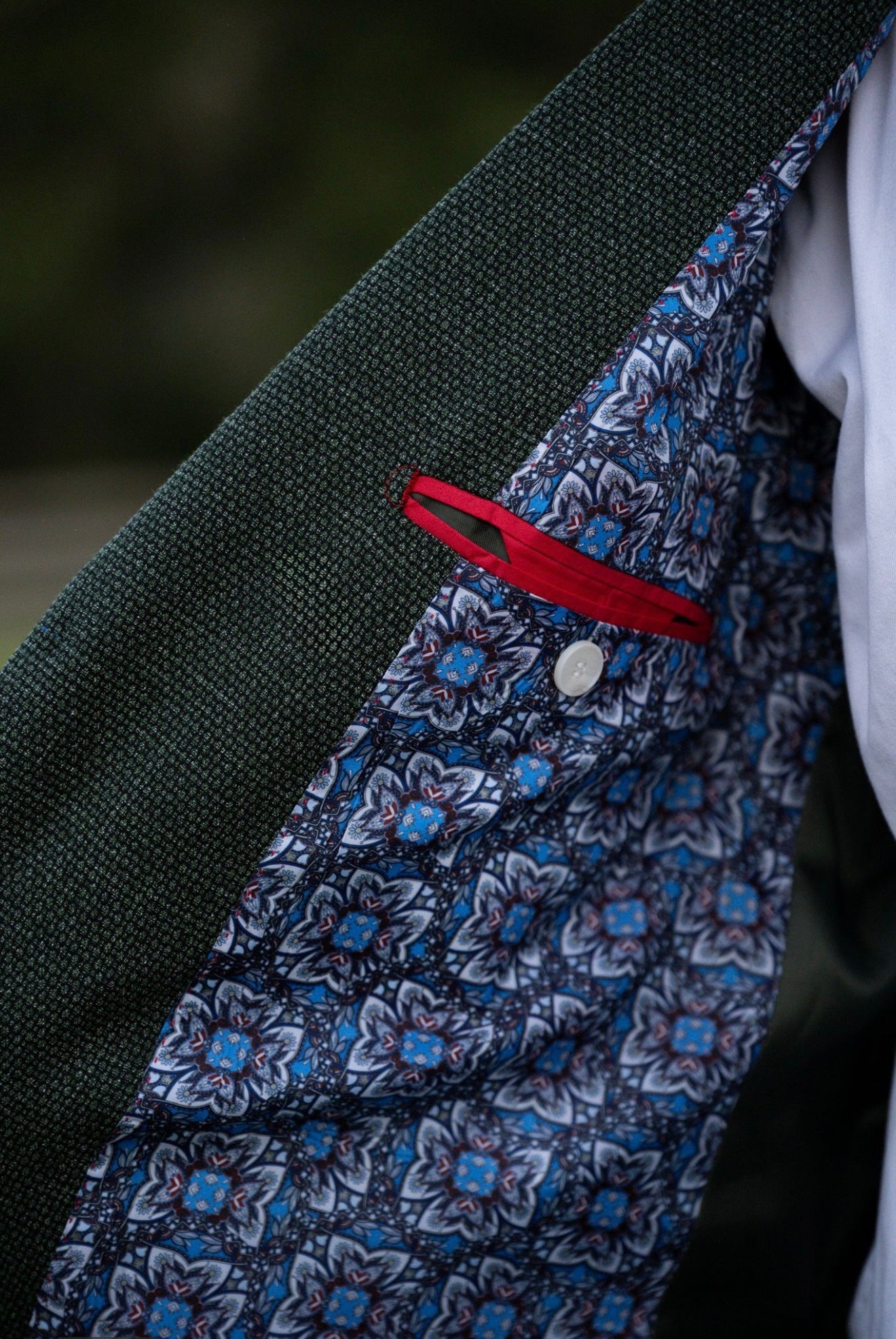 Close-up geometric blue interior lining on Cowboy Emerald Chino Sport Coat