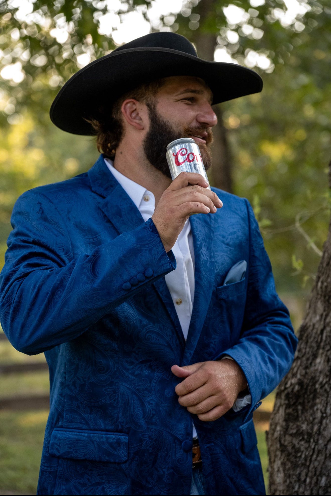 Royal Blue Cowboy Sport Coat styled with jeans and boots, western formal outfit for men.